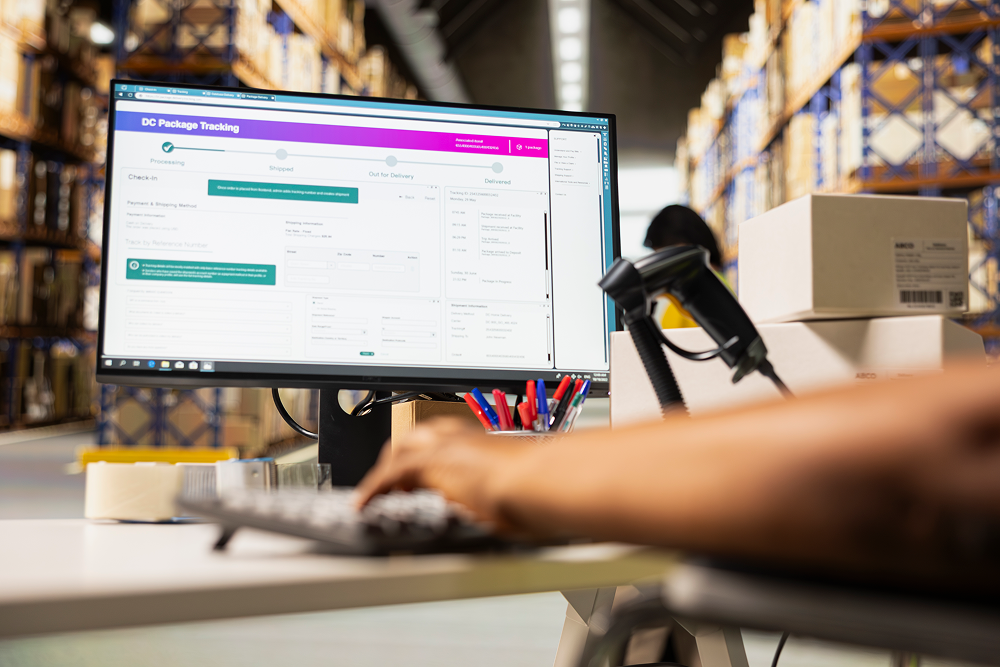 african-american-worker-with-disability-uses-airway-bill-numbers-tracking-info-software